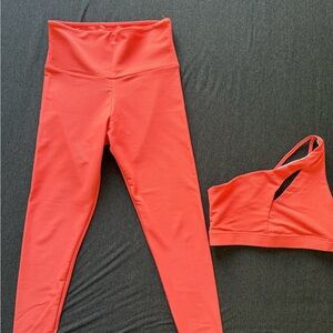 Onzie Coral and White Sports Bra and Leggings